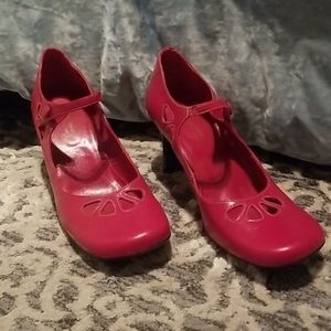 Red leather heels with cutouts and Mary Jane strap
